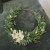 wianek-zielony-z-białymi-magnoliami-zielenią.jpg